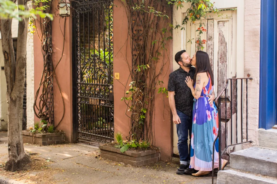Engagement photos of a couple at Fitler Square in Philadelphia.
