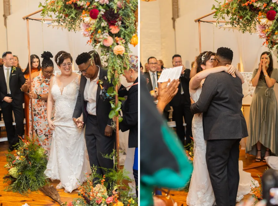 The couple jumping the broom and breaking the glass before kissing at the end of their ceremony.
