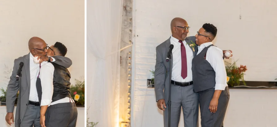 A father of the marrier gives a hug after his toast.