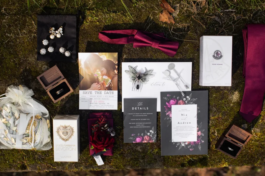 A mossy flat lay of the marriers getting ready details.