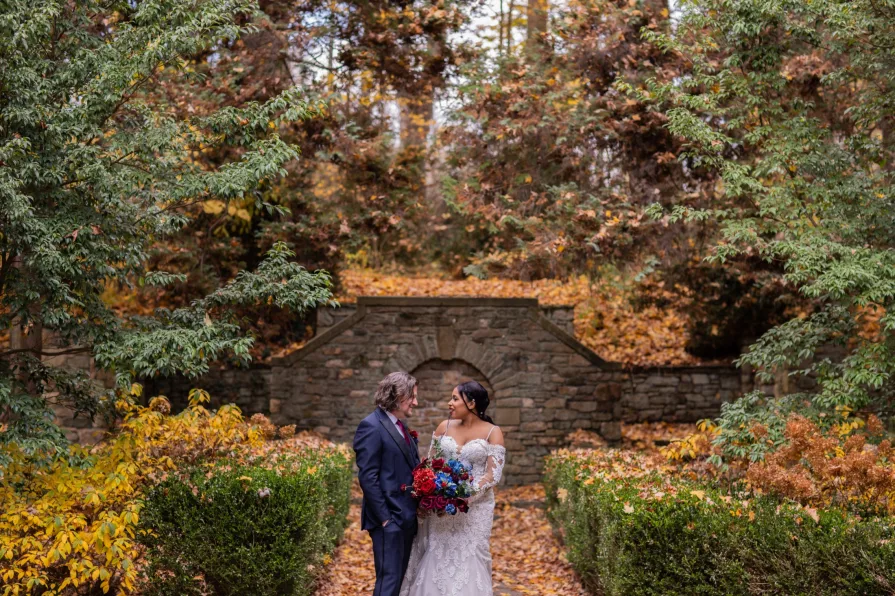 Wedding portraits near the fountain at Ridley Creek State Park.