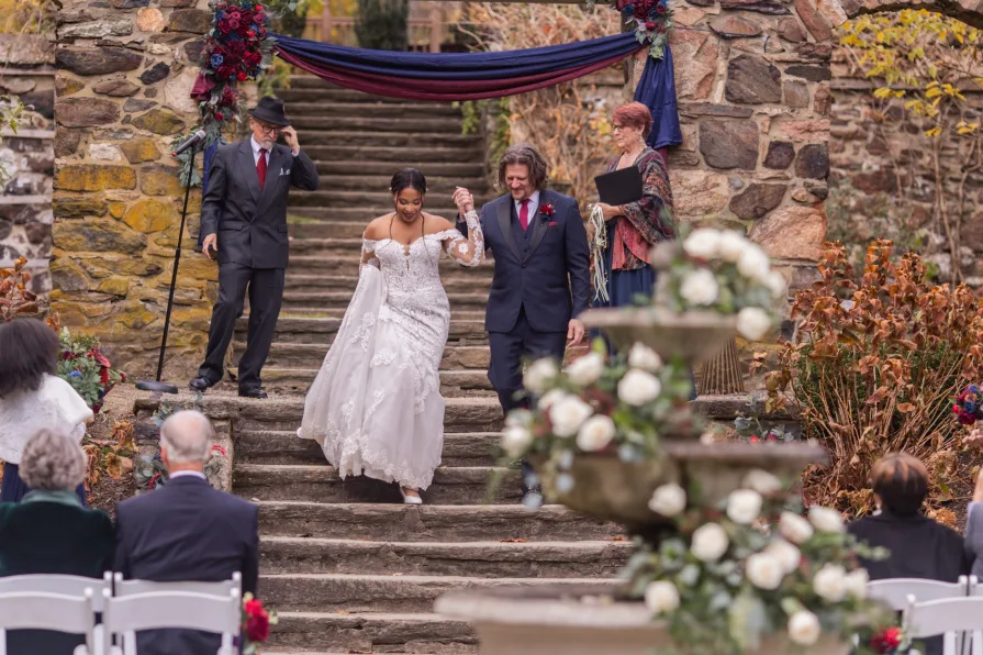 A fall wedding ceremony at Parque at Ridley Creek State Park.