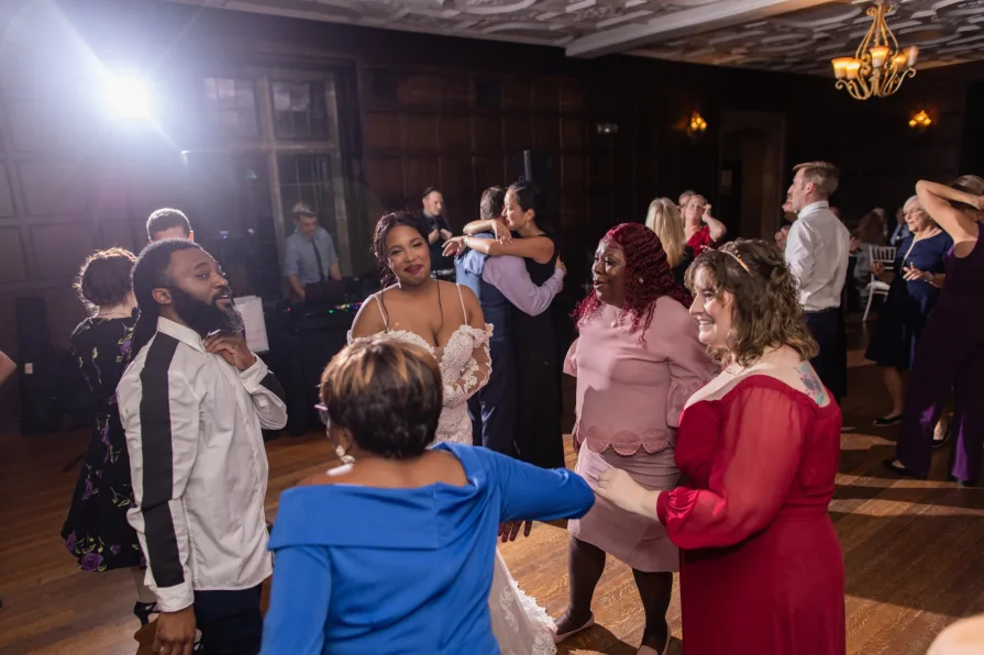 Wedding reception photos of couples smiling and dancing at a venue in the Philadelphia suburbs.