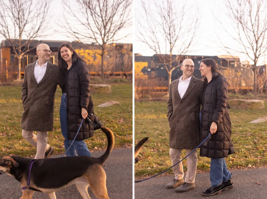 A couple walking with their dog near Schuylkill River Trail after getting engaged in Philadelphia.