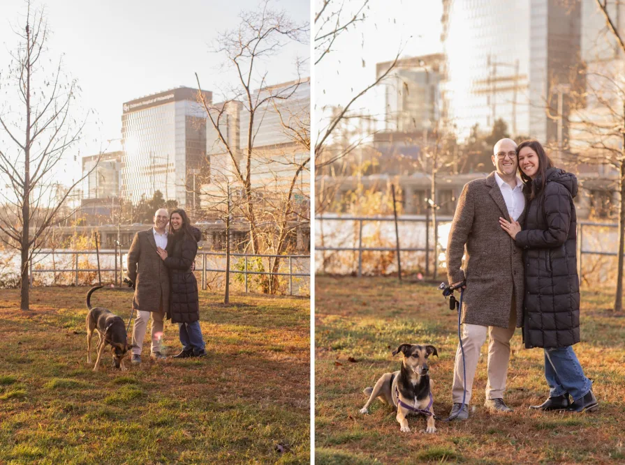 A couple walking with their dog near Schuylkill River Trail after getting engaged in Philadelphia.