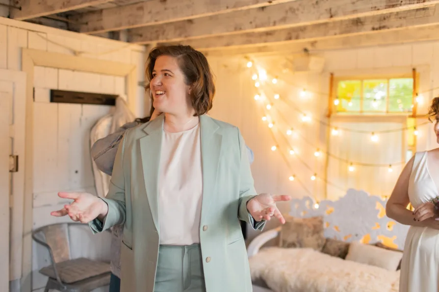 A queer couple getting ready at the Mushroom House at Terrain for their wedding