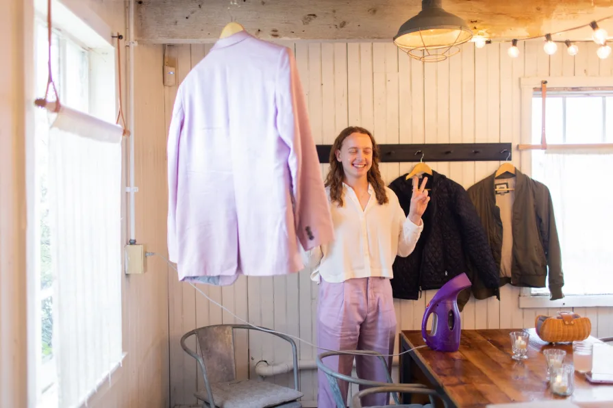 A queer couple getting ready at the Mushroom House at Terrain for their wedding