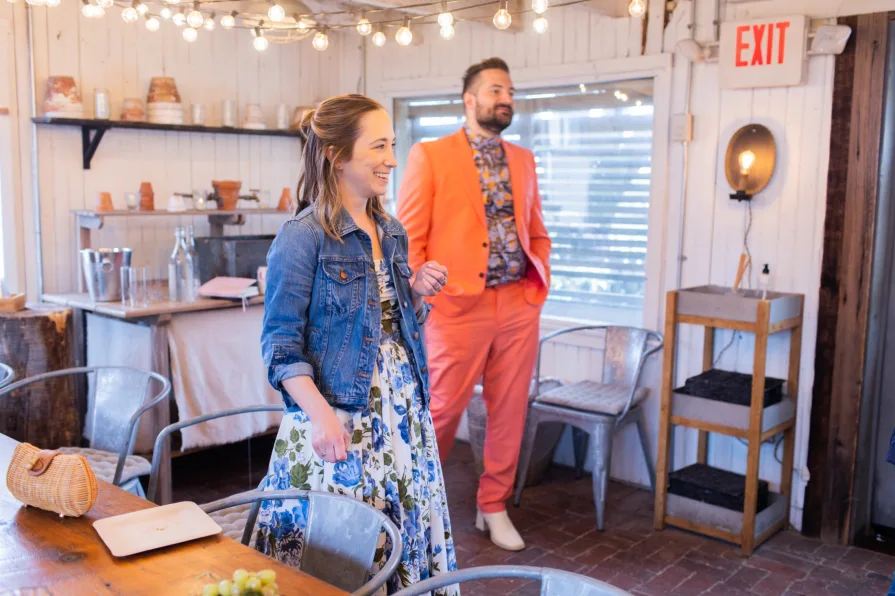 A queer couple getting ready at the Mushroom House at Terrain for their wedding