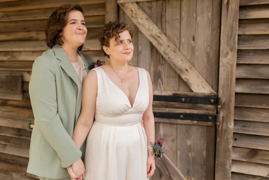 Wedding photos at Terrain at Styer's with a queer couple.