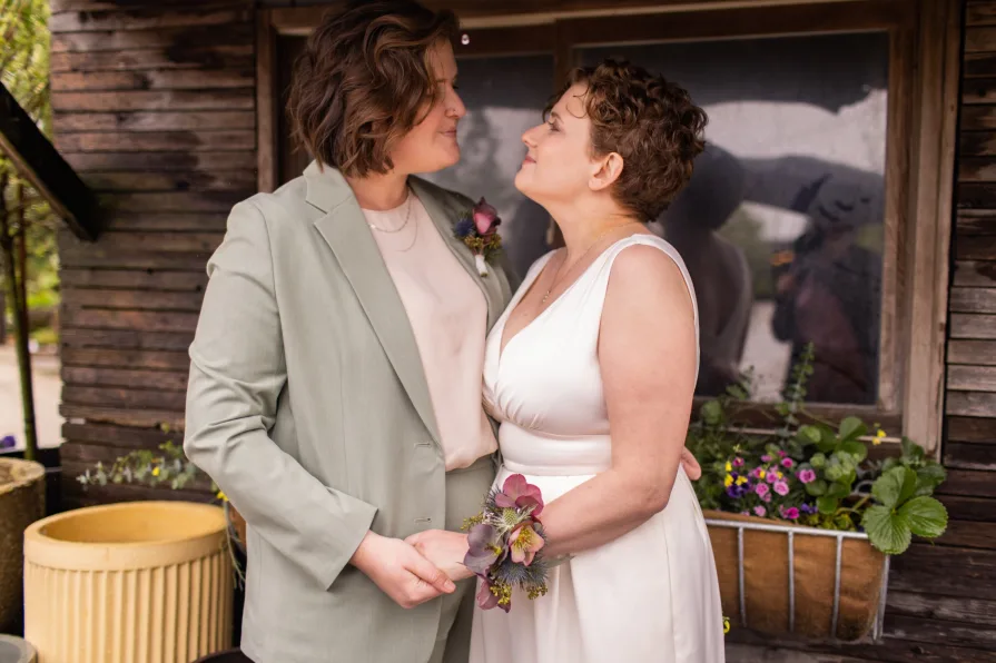 Wedding photos at Terrain at Styer's with a queer couple.