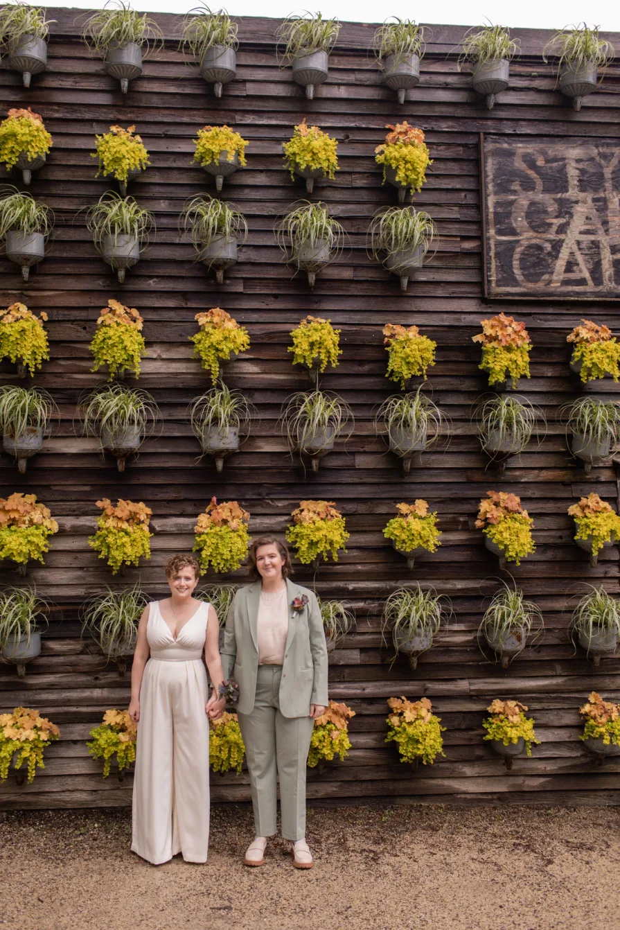 Wedding photos at Terrain at Styer's with a queer couple.