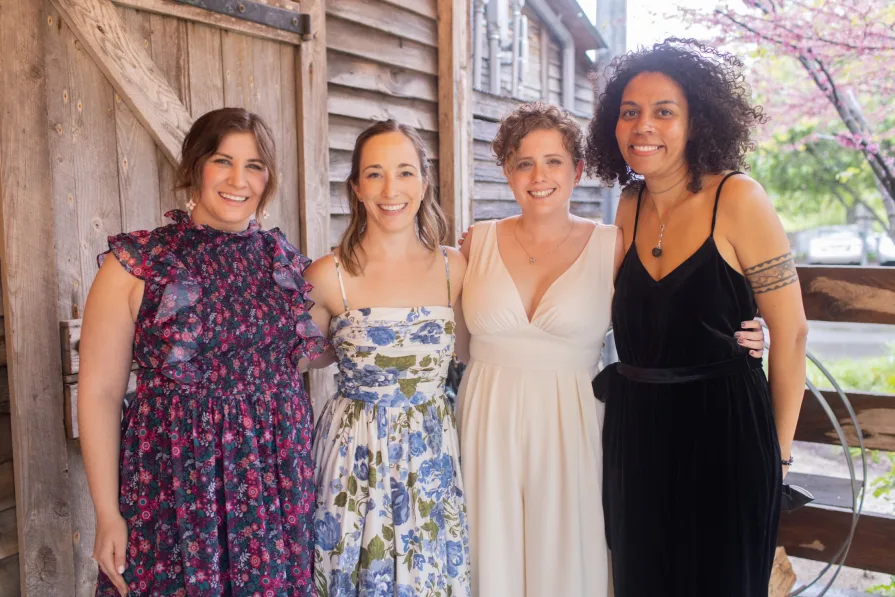 Wedding guests celebrating a queer couple at Terrain at Styer's.