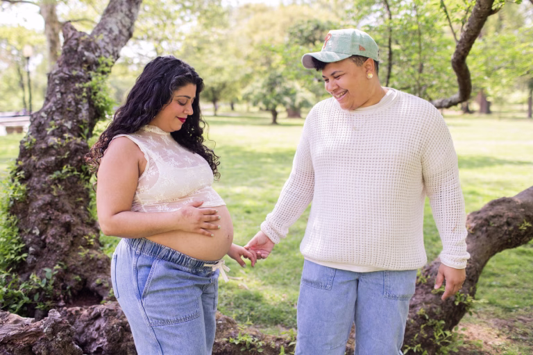 Queer pregnancy photos outside of Fairmount Park Horticulture Center.